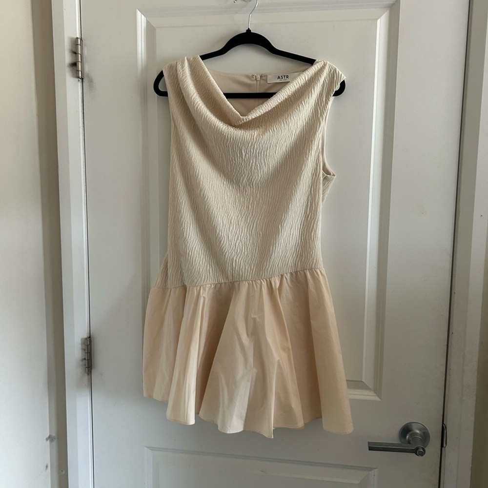 Astr Sleeveless Cowl Neck Peplum Dress in Cream